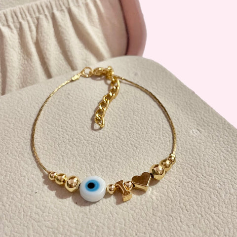 Pulsera personalizada ojo turco con inicial.